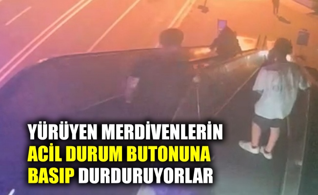 Yürüyen merdivenlerin acil durum butonuna basıp durduruyorlar