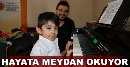 Omurilik felçlisi küçük piyanist hayata meydan okuyor