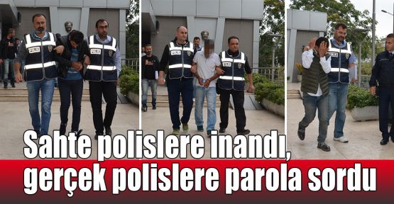 Sahte polislere inandı, gerçek polislere parola sordu