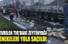  Devrilen tırdaki zeytinyağı tenekeleri yola saçıldı