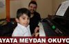 Omurilik felçlisi küçük piyanist hayata meydan okuyor